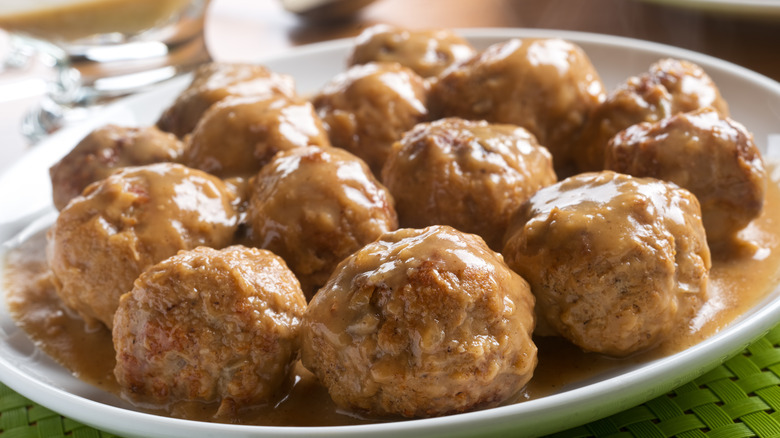 A plate of Meatballs in a creamy Brown mushroom gravy