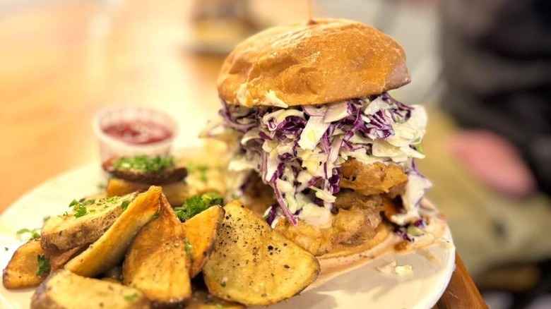 Fried chicken sandwich with fries