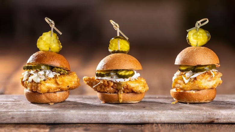 Fried chicken sliders with pickle skewer toppers