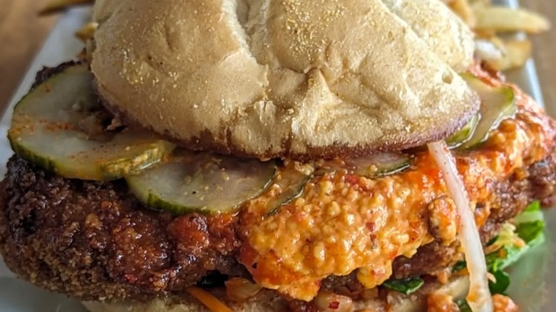 Chickzilla sandwich overflowing with toppings