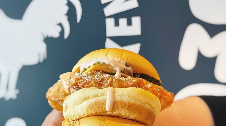 Original fried chicken sandwich displayed by sign