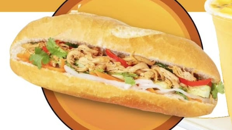 Chicken bahn mi on orange plate
