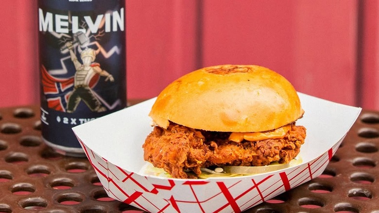 Chicken sandwich with a drink