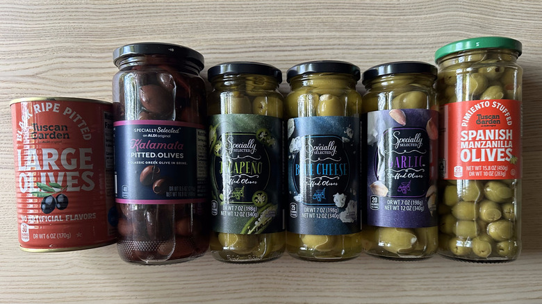 Aldi olives arranged on wooden table