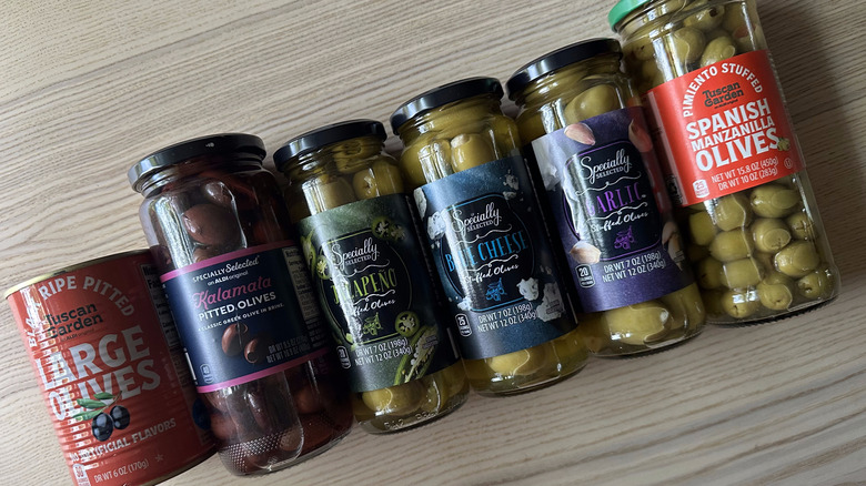 Aldi olives arranged on wooden table