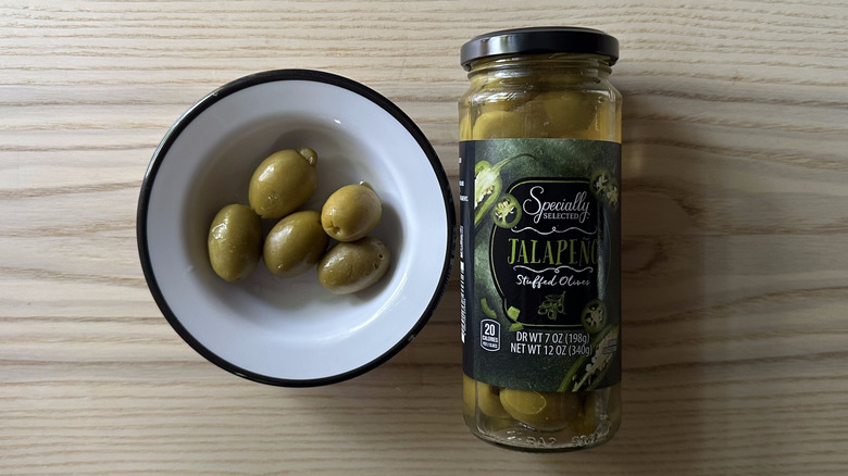 Specially Selected Jalapeño Stuffed Olives in white bowl