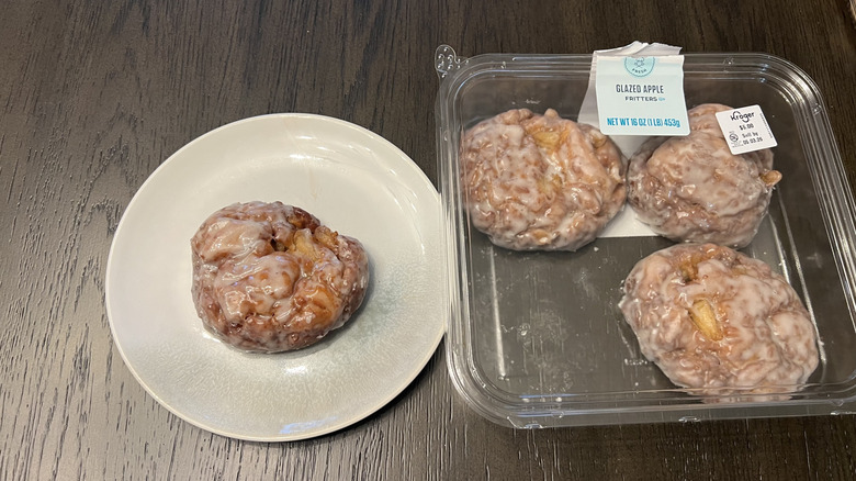 Kroger Bakery Fresh glazed apple fritter on a plate.