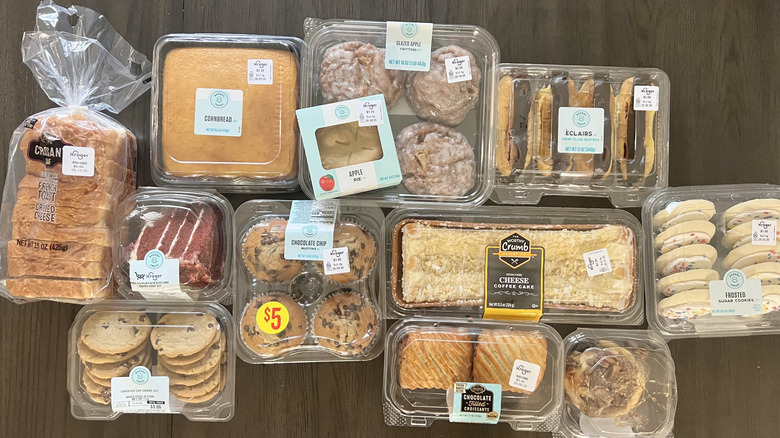 12 different bakery items in containers from Kroger.