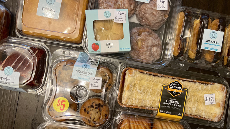 12 Kroger bakery items still in plastic containers.