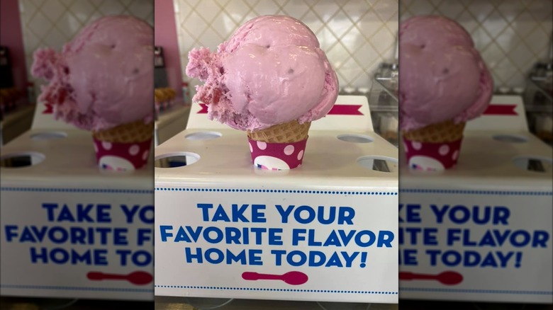Scoop of Pink Bubblegum ice cream in a cone from Baskin Robbins