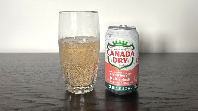Canada Dry Zero-Sugar Strawberry Fruit Splash poured in a glass.