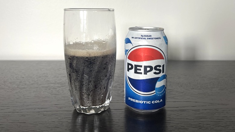 Pepsi Prebiotic Cola poured into a glass.