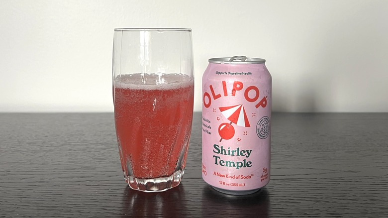 Shirley Temple Olipop poured into a glass.