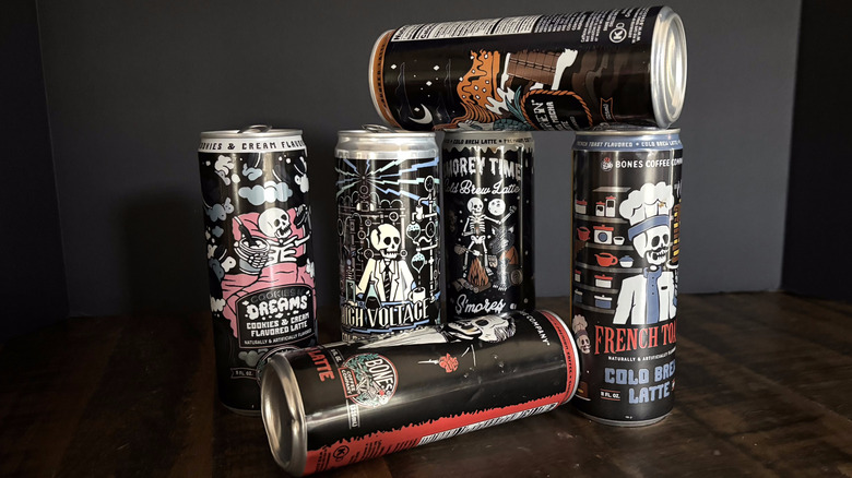 Bones Coffee Company RTD canned lattes on a wooden table