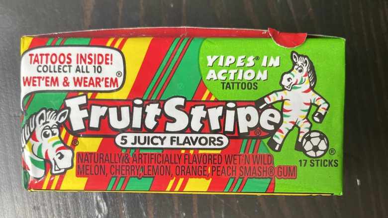 Fruit Stripe gum on a dark table