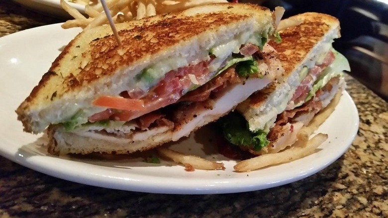 Club sandwich and fries at BJ's Restaurant and Brewhouse