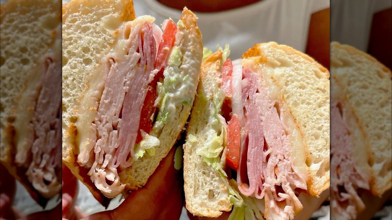 Hands holding Firehouse Subs' club