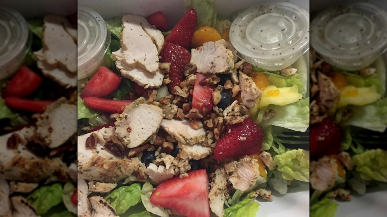 Mirrored image, close up of Panera Strawberry Poppyseed salad