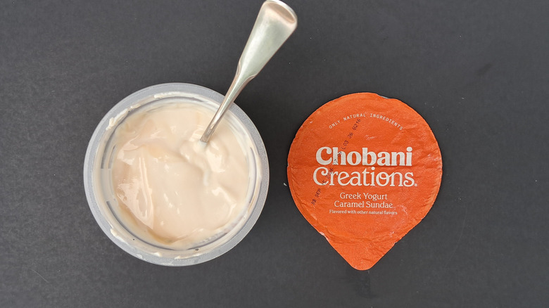 yogurt in cup with spoon
