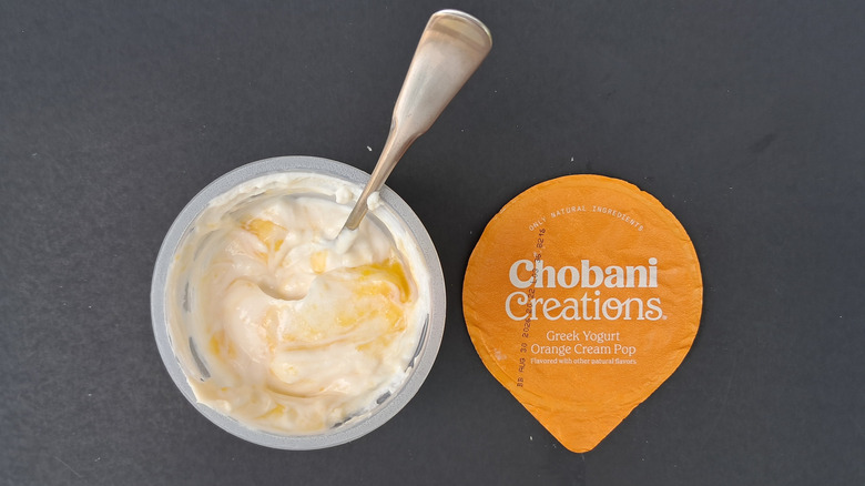 yogurt in cup with spoon