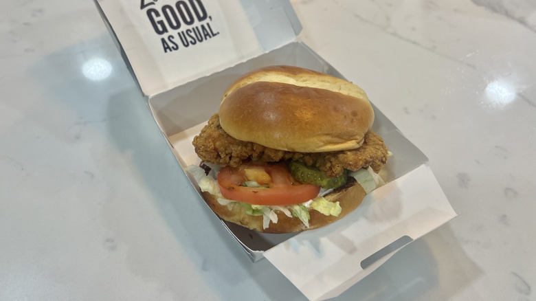 Culver's crispy chicken sandwich in to-go box.