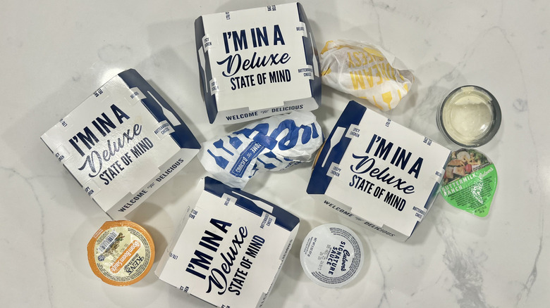 Six different culver's chicken items in packaging.