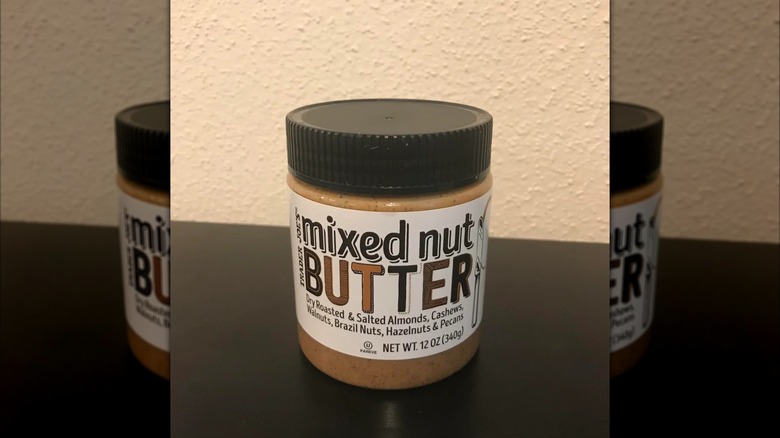 Mixed Nut Butter jar on a table