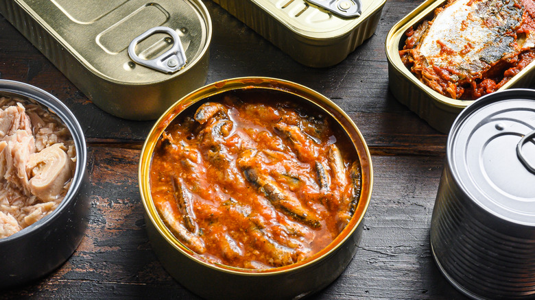 Display of canned fish in various sauces