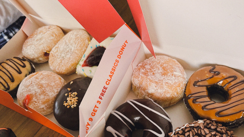 Two open boxes of Dunkin' donuts