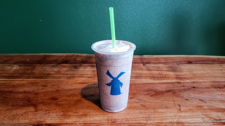 Dutch Bros chocolate shake on a table.