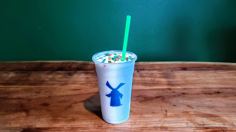 Dutch Bros Birthday cake shake on a table.