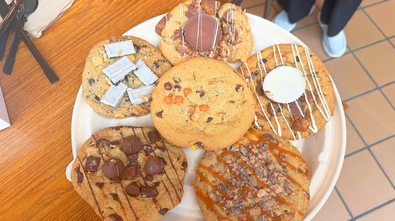Top-down shot of six cookies on plate from Hershey's Chocolate World Bakery