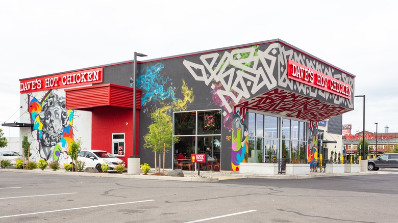 Dave's Hot Chicken building surrounded by parking lot