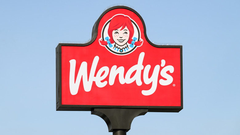 Red Wendy's against blue sky background