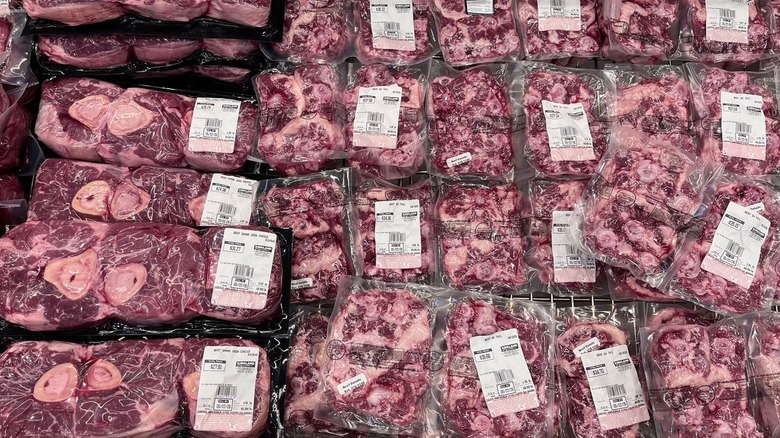 Various meat products in refrigerated section at Costco