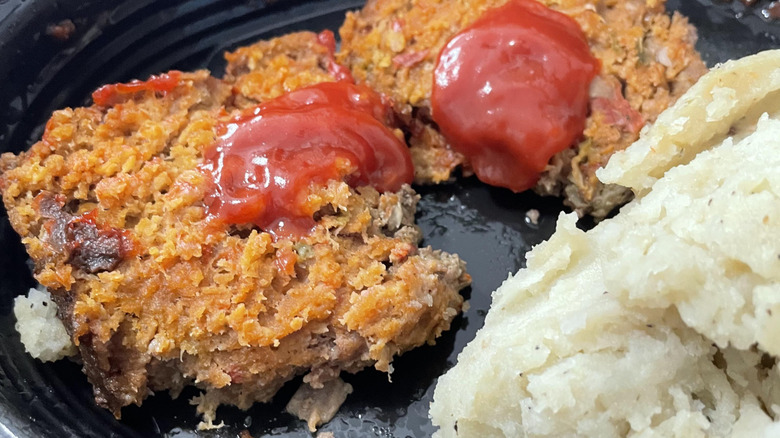 Meatloaf and mashed potatoes from Cracker Barrel on a plate