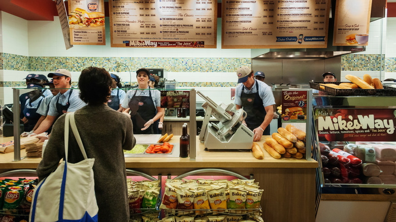 Customer waiting to order at Jersey Mike's counter