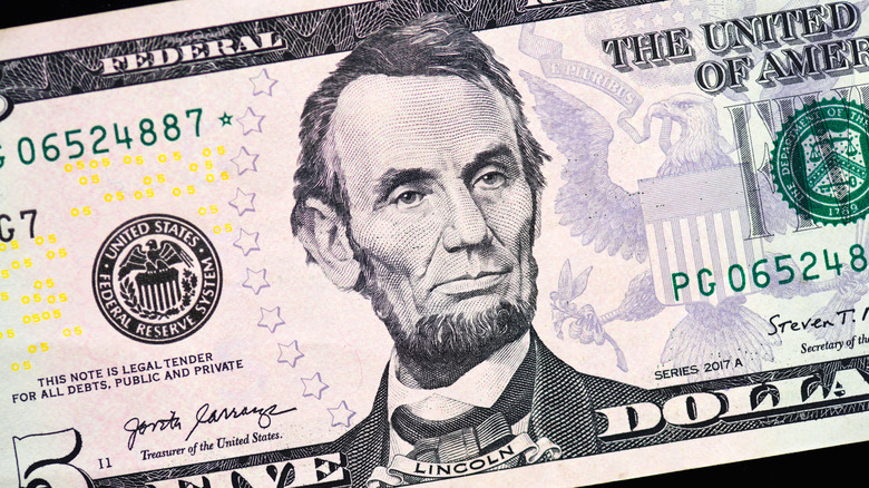 Close up of a five dollar bill