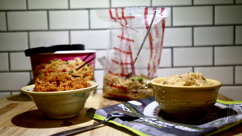 Bowls of rice and rice containers