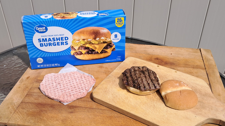 cooked and raw hamburger patties