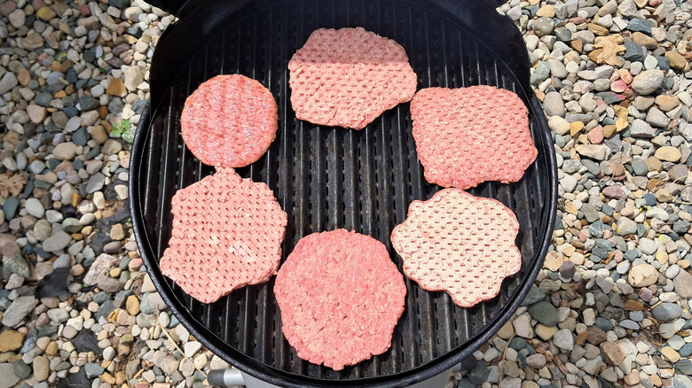six burgers on grill