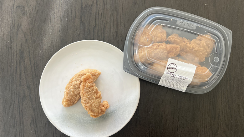 Fresh from Meijer chicken tenders on a plate.