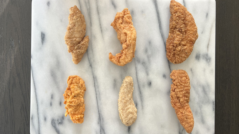 Six different grocery store deli chicken tenders.