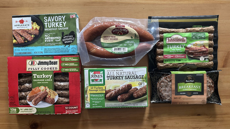 Turkey sausage packages on wooden table