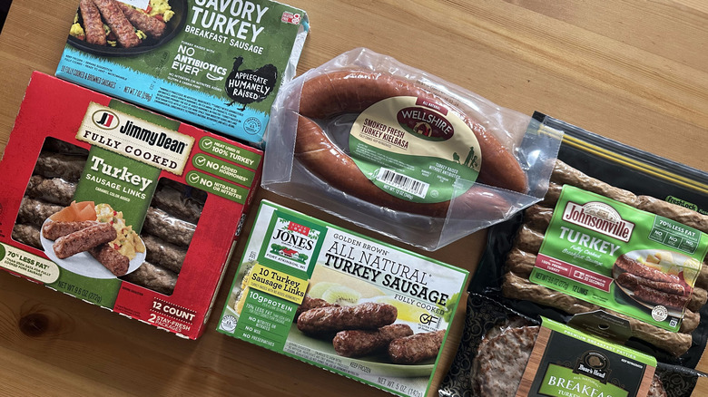 Turkey sausage packages on wooden table
