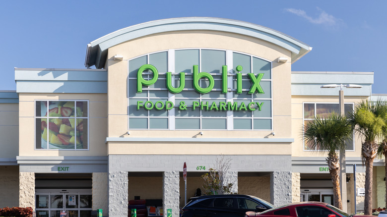 Publix sign on large building against blue sky