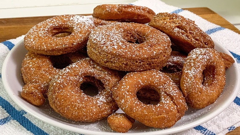 A pile of fried dough shaped into a ring