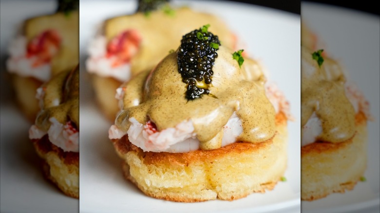 royal eggs benedict plated at Delmonico's in New York