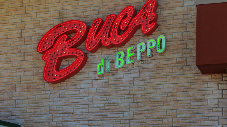 A close up of the Buca di Beppo sign on restaurant building