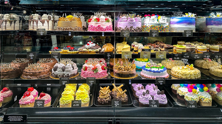 Display of decorated cakes at grocery store bakery